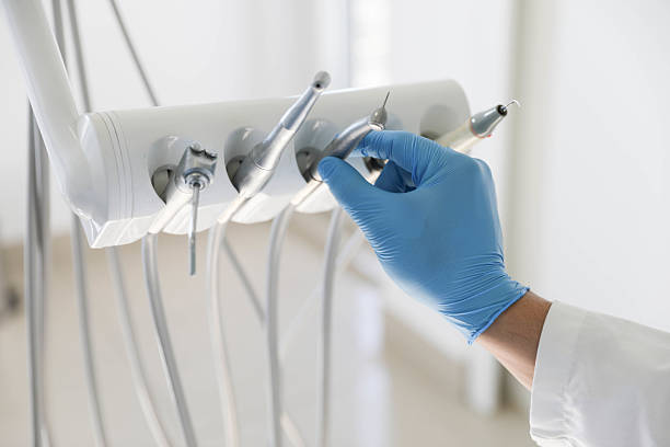 Professional Tooth Extraction technician working in Gilberts, IL